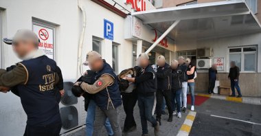 Suspects detained as part of an investigation into Mossad&#039;s activities in Türkiye escorted by police to undergo routine medical checks, Istanbul, Türkiye, Jan. 4, 2024. (AA Photo)