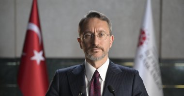 Communications Director Fahrettin Altun speaks via video message at a panel hosted by Türkiye's Embassy in London, Monday, April 8, 2024. (AA Photo)