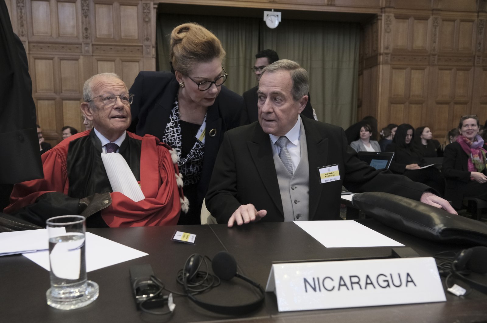 Nicaragua&#039;s Ambassador Carlos Jose Arguello Gomez (R) and Alain Pellet (L), a lawyer representing Nicaragua, wait for the start of a two-day hearing at the World Court, The Hague, Netherlands, April 8, 2024. (AP Photo)