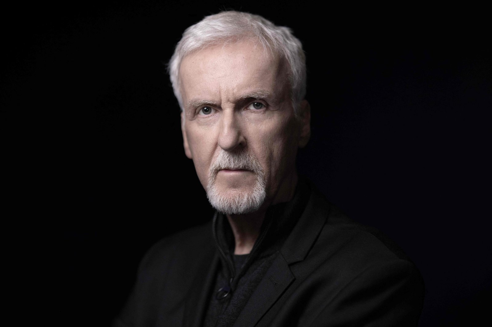 Canadian filmmaker James Cameron poses during a photo session in Paris ahead of the opening of the exhibition entitled &quot;The Art of James Cameron&quot; at the Cinematheque Francaise, France, April 3, 2024. (AFP Photo)