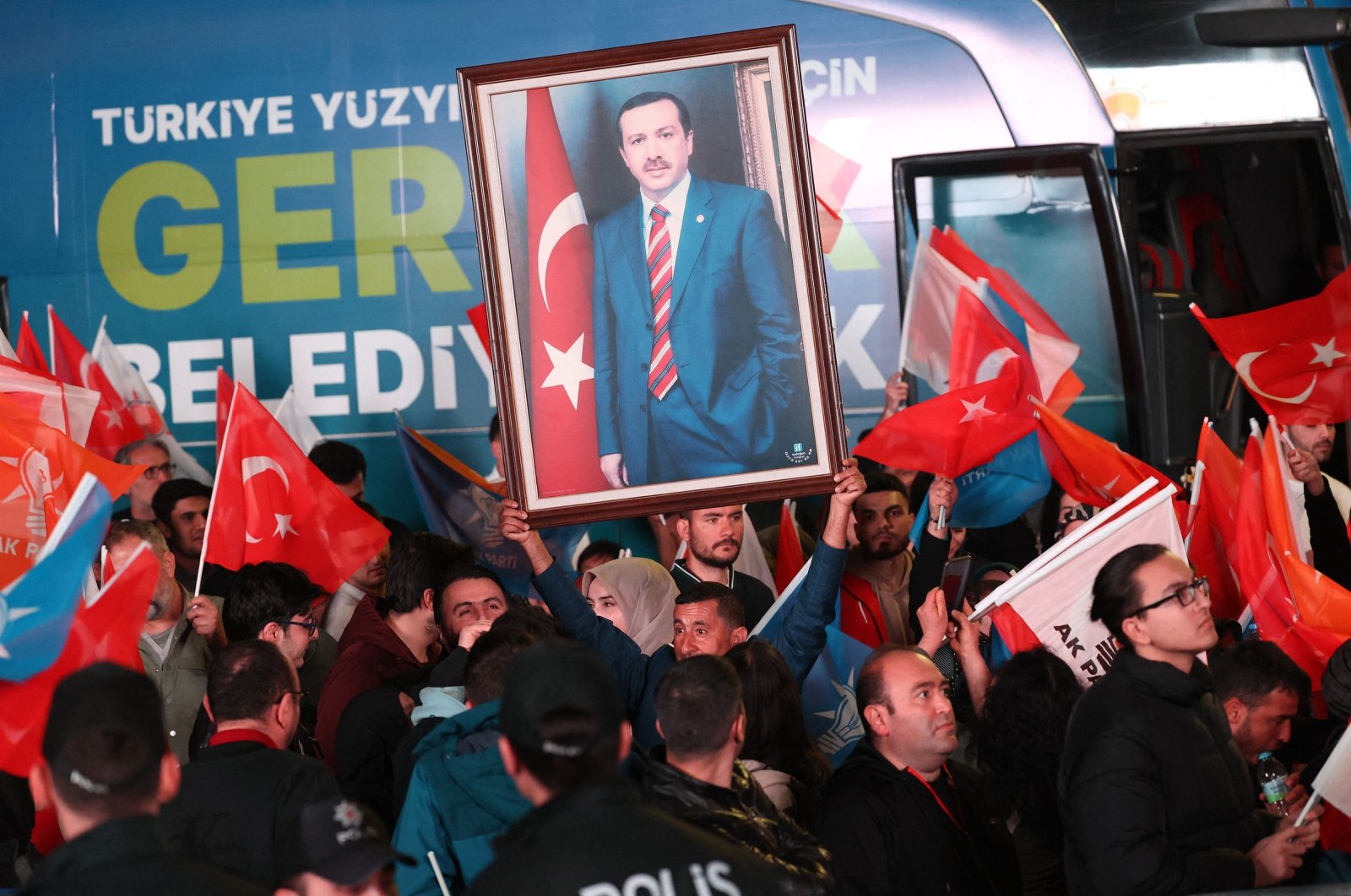 Supporters of the Justice and Development Party (AK Party) cheer as President Recep Tayyip Erdoğan delivers a speech after the local elections, at AK Party headquarters, Ankara, Türkiye, April 1, 2024. (AFP Photo)