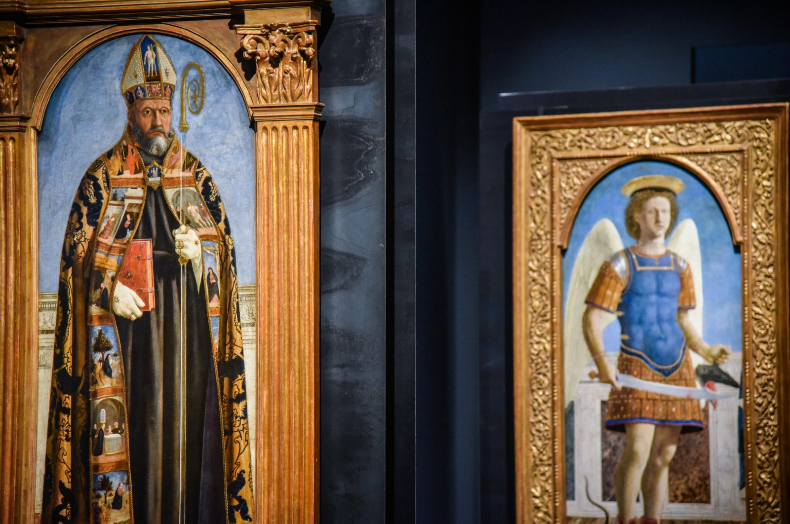 The paintings &quot;Sant’Agostino&quot; (L) and &quot;San Michele Arcangelo&quot; (R), two panels of the Augustinian Polyptych created by Piero Della Francesca, are on display during the exhibition &quot;Piero della Francesca and the reunited Augustinian Polyptych&quot; at the Poldi Pezzoli Museum in Milan, Italy, March 19, 2024. (EPA Photo)