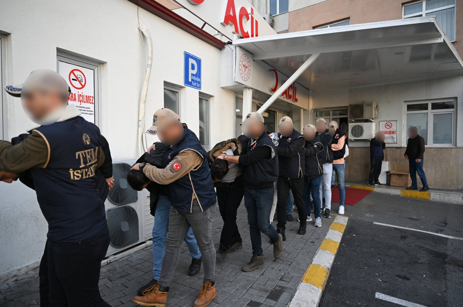 Suspects detained as part of an investigation into Mossad&#039;s activities in Türkiye escorted by police to undergo routine medical checks, Istanbul, Türkiye, Jan. 4, 2024. (AA Photo)