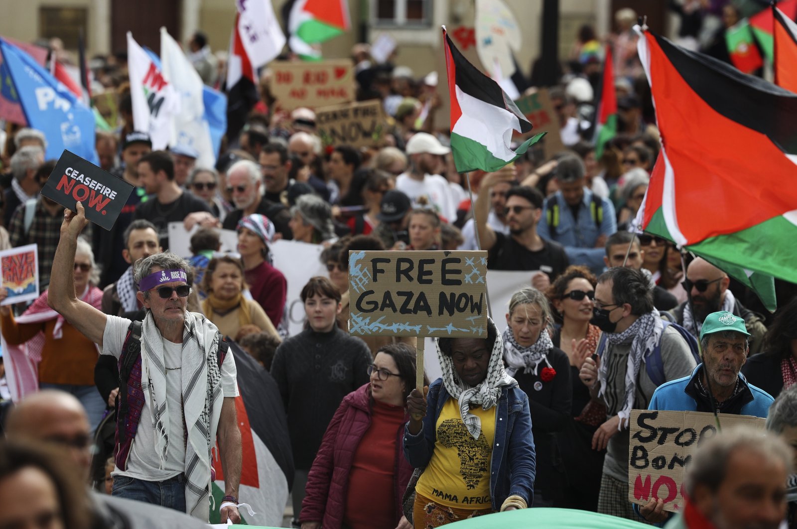 Participants attend the &quot;April for Palestine&quot; demonstration, organized by the Platform for Solidarity with Palestine, on the day that marks six months of the armed conflict in the Gaza Strip, Lisbon, Portugal, April 7, 2024. (EPA Photo)