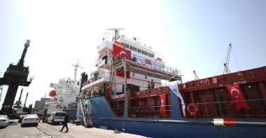 The Disaster and Emergency Management Authority (AFAD) loads humanitarian aid supplies onto a vessel for Gaza at the Port of Mersin, southern Mersin province, Türkiye, March 28, 2024. (AA Photo)