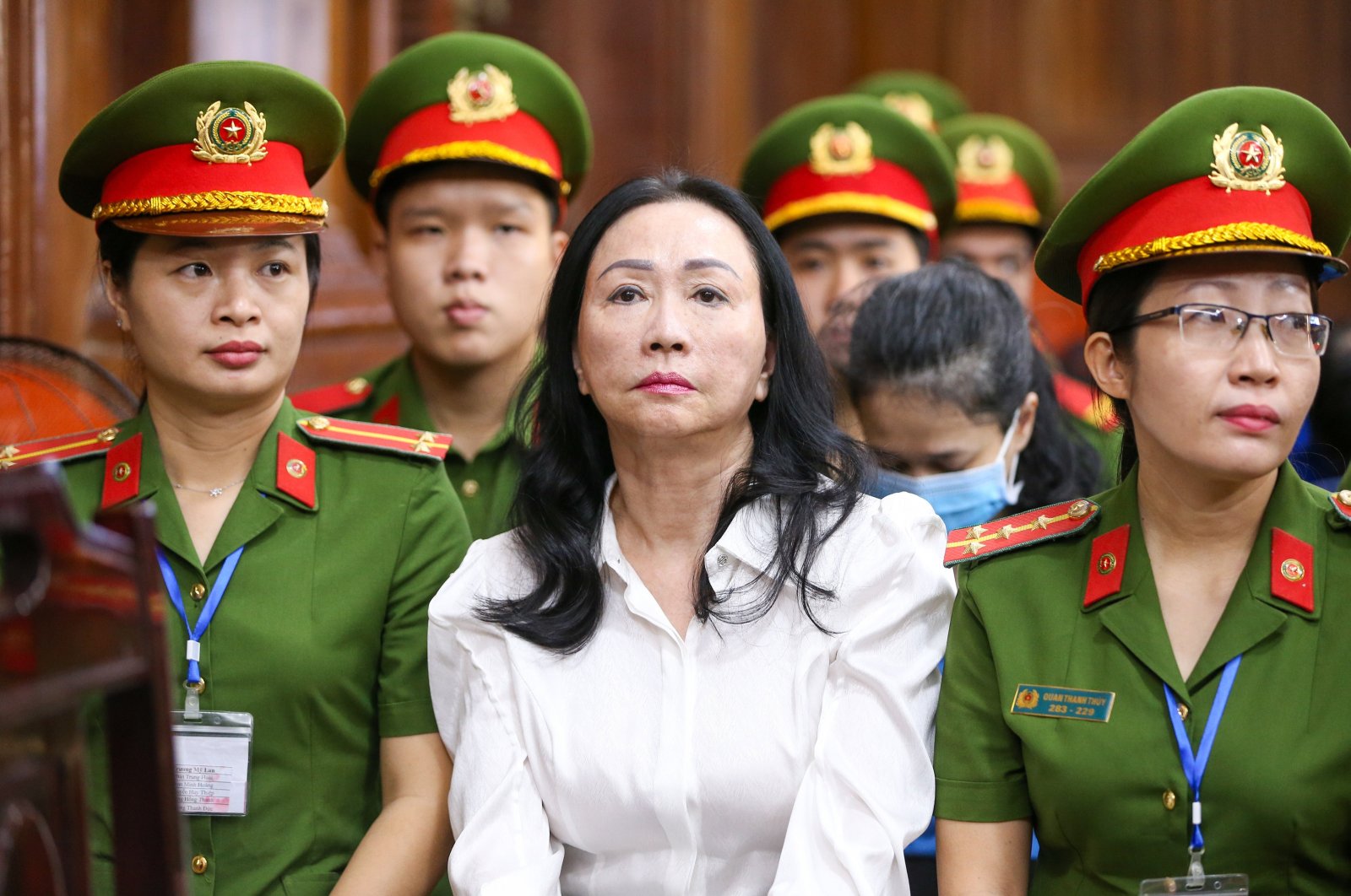 Truong My Lan (C), chairperson of Van Thinh Phat Holdings, sits during her trial at the Ho Chi Minh City People&#039;s Court in Ho Chi Minh City, Vietnam, April 11, 2024. (EPA Photo)
