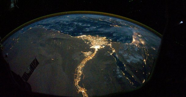 A NASA satellite image, taken by one of the Expedition 25 crew members on the International Space Station, shows the lights of Cairo, Alexandria and the Nile River, Egypt, Oct. 28, 2010. (Reuters Photo)