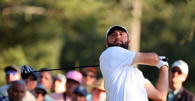 Scottie Scheffler hits his tee shot on the 18th hole during the third round of the Masters at the Augusta National Golf Club, Augusta, Georgia, U.S., April 13, 2024. (Reuters Photo)