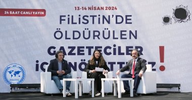 Sinan Burhan (R), journalist Fulya Öztürk (C) and columnist Mustafa Kartoğlu (L) attend the 24-hour broadcast in Istanbul, Türkiye, April 13, 2024. (AA Photo)