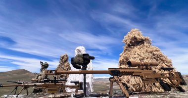 Snipers of the Turkish army pose with their weapons during a military drill in Kars, eastern Türkiye, April 4, 2024. (AA Photo)