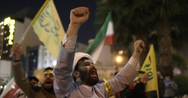 Iranians celebrate on a street after the IRGC retaliatory attack on Israel, Tehran, Iran, April 14, 2024. (Reuters Photo)