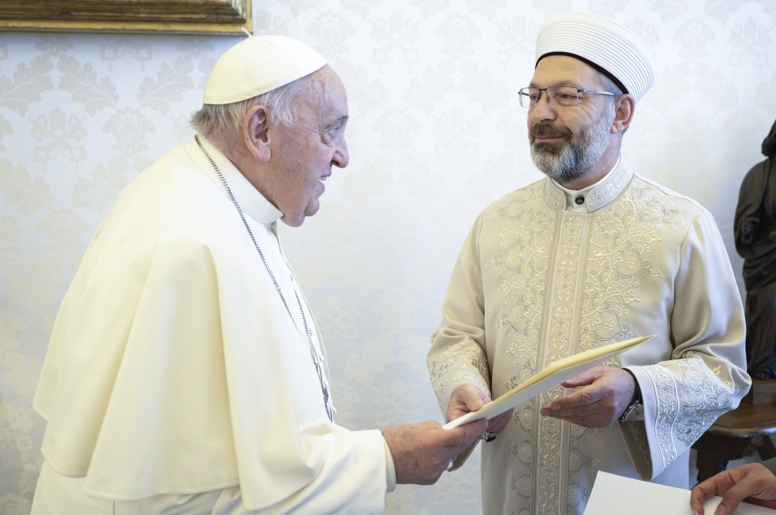 Ali Erbaş (R) presents President Recep Tayyip Erdoğan&#039;s letter to Pope Francis, Vatican City, Vatican, April 13, 2024. (AA Photo)