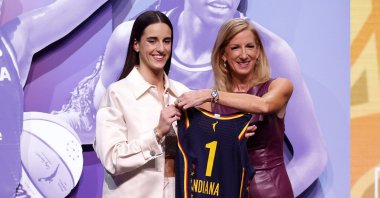 Caitlin Clark (L) poses with WNBA Commissioner Cathy Engelbert after being selected first overall pick by the Indiana Fever during the 2024 WNBA Draft at Brooklyn Academy of Music, New York City, U.S., April 15, 2024. (AFP Photo)