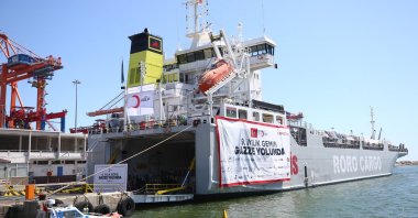 The Turkish Red Crescent loads humanitarian aid supplies onto a vessel for Gaza at the Port of Mersin, southern Mersin province, Türkiye, April 16, 2024. (AA Photo)