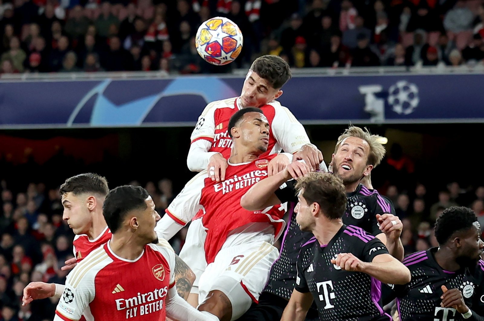 Arsenal&#039;s Kai Havertz (C top) rises above his teammate Gabriel and Bayern Munich&#039;s Harry Kane to head the ball during the UEFA Champions League quarterfinals, 1st leg match, London, U.K., April 9, 2024. (EPA Photo)