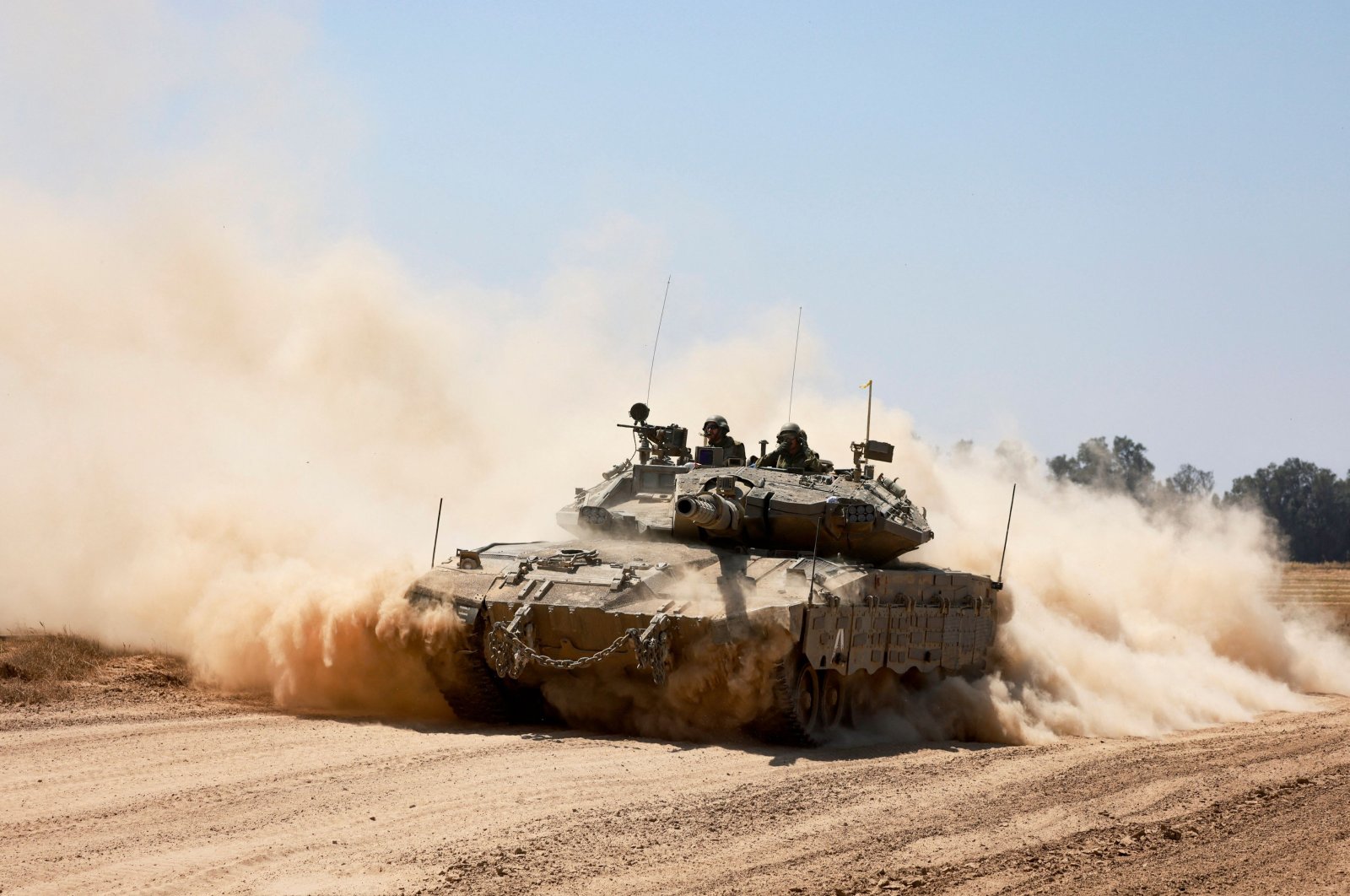 This picture taken from Israel&#039;s southern border with the Gaza Strip shows an Israeli tank rolling along the border with Palestine, April 16, 2024. (AFP Photo)