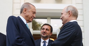 Russian President Vladimir Putin (R) and Turkish President Recep Tayyip Erdoğan (L) bid farewell after their meeting, in Sochi, Russia, September 2023. (EPA Photo) 
