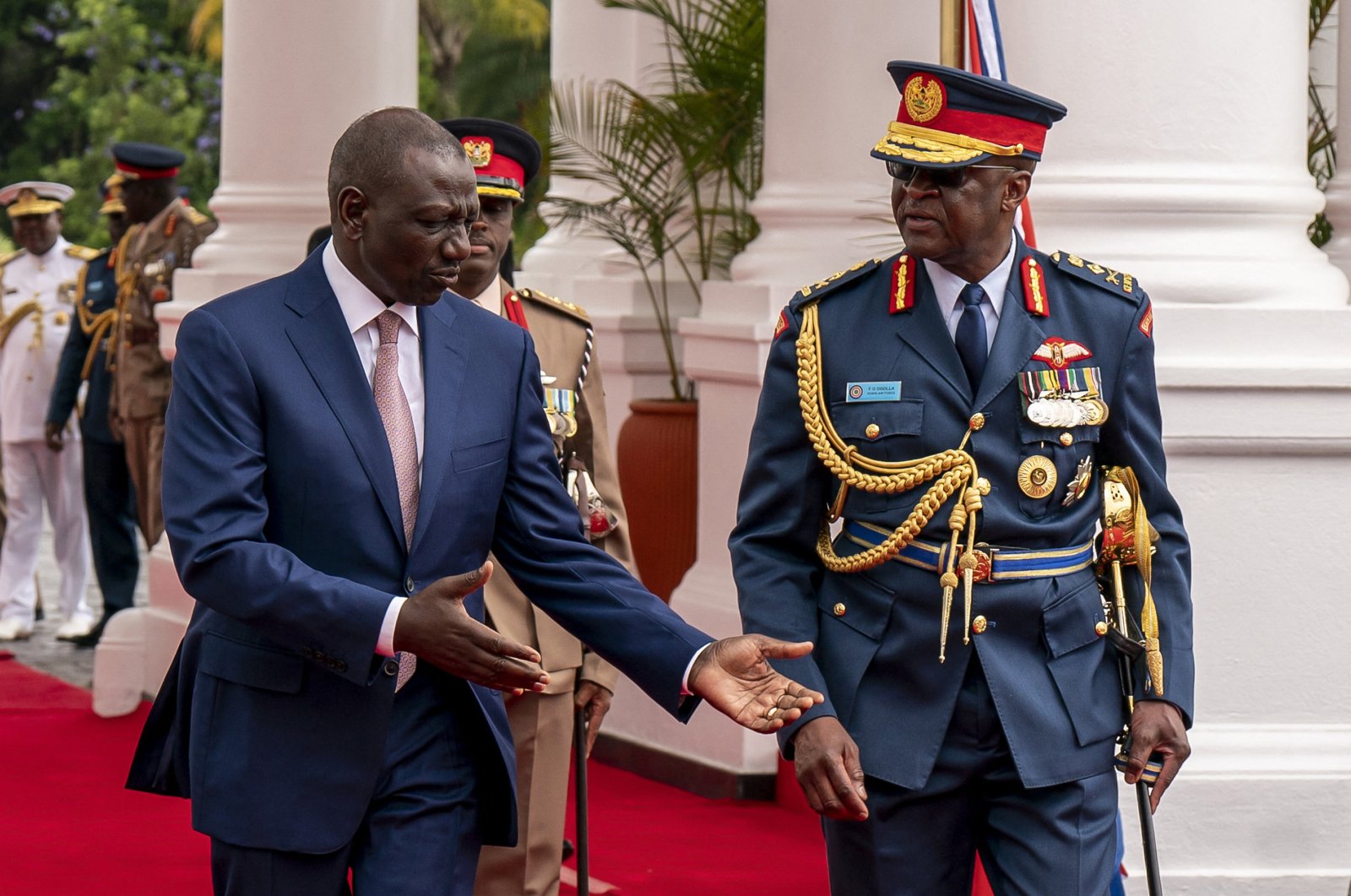 Chief of Kenya Defense Forces Gen. Francis Ogolla (R) speaks to Kenyan President William Ruto (L) and Kenyan first lady Rachel Ruto (unseen) as they prepare to receive Britain&#039;s King Charles III and Queen Camilla (unseen) during a ceremonial welcome, State House, Nairobi, Kenya, Oct. 31, 2023. (AFP Photo)
