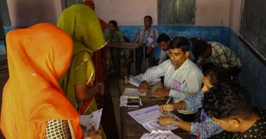 Women arrive to cast their ballot at a polling station in the first phase of voting for the India&#039;s general elections in Parbatsar, Rajasthan, India, April 19, 2024. (AFP Photo)