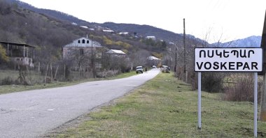 A road sign sits at the entrance to the village of Aşağı Eskipara (Voskepar), March 27, 2024. (AFP File Photo)