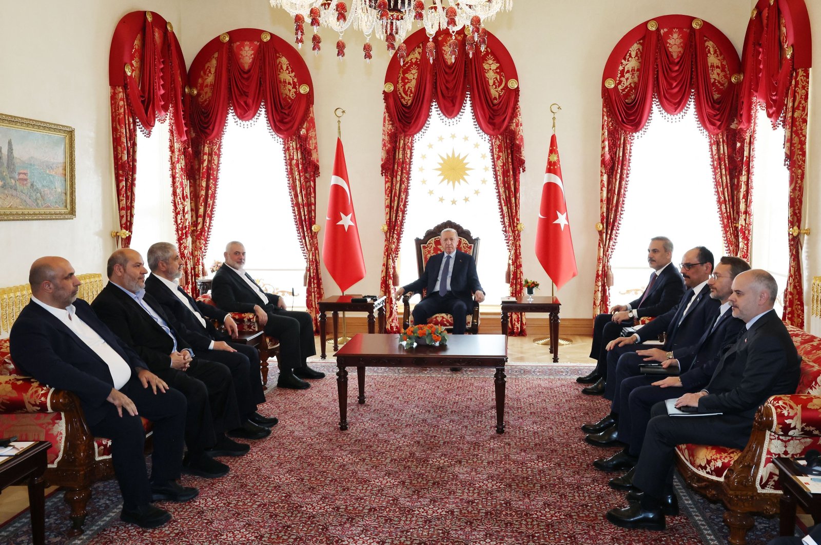 President Recep Tayyip Erdoğan meeting with Hamas political bureau chief Ismail Haniyeh (4thL), and their delegations at the Dolmabahçe Presidential working office in Istanbul, April 20, 2024. (Presidential Communications Directorate Handout) 