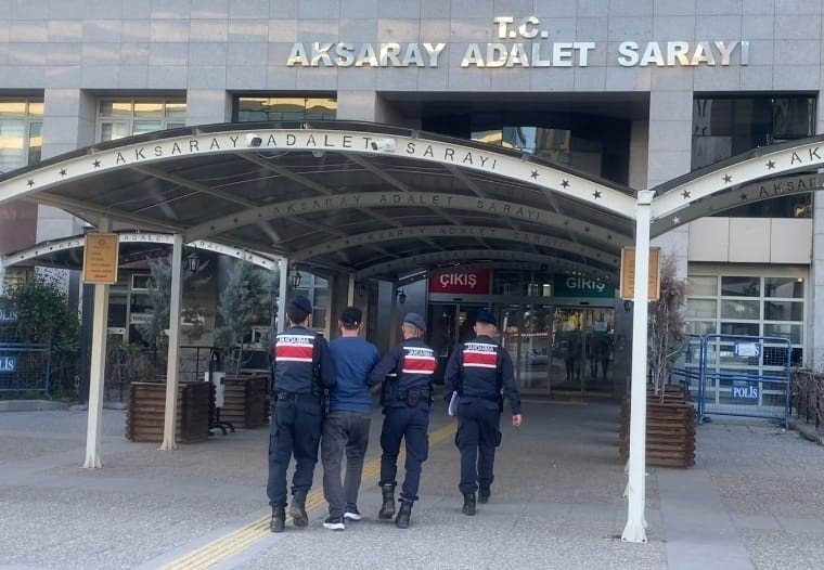 Gendarmerie officers escort to the courthouse a Daesh member caught while trying to travel to Ankara, Aksaray province, Türkiye, April 17, 2024. (IHA Photo)