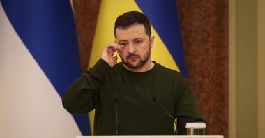 Ukrainian President Volodymyr Zelenskyy wipes his eye during a press conference with Finland&#039;s President Alexander Stubb, in Kyiv, Ukraine, April 3, 2024. (AP Photo)