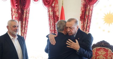 President Recep Tayyip Erdoğan (R) welcomes Hamas senior official Khaled Meshaal as Ismail Haniyeh, leader of the Palestinian resistance group Hamas, looks on during a meeting in Istanbul, Türkiye, April 20, 2024. (Reuters Photo)