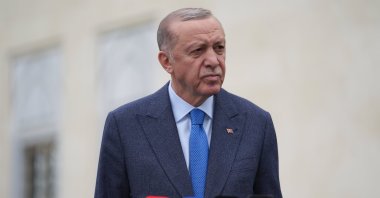 President Recep Tayyip Erdoğan talks to reporters following Friday prayers in Istanbul, Türkiye, April 19, 2024. (AA Photo) 