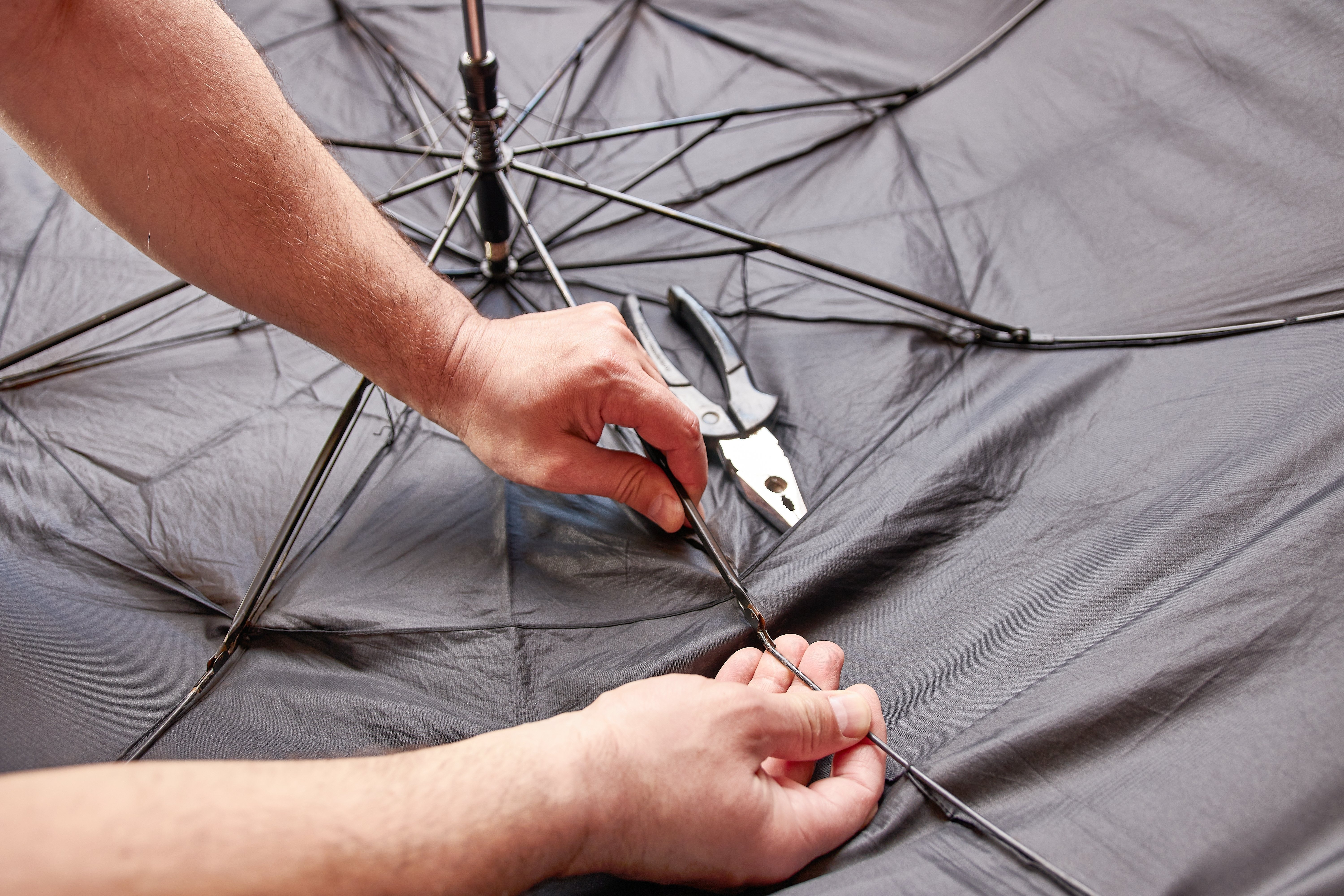 Marija Lah, Slovenia&#039;s last umbrella repairer, sustains her family&#039;s tradition by fixing umbrellas. (Shutterstock Photos)