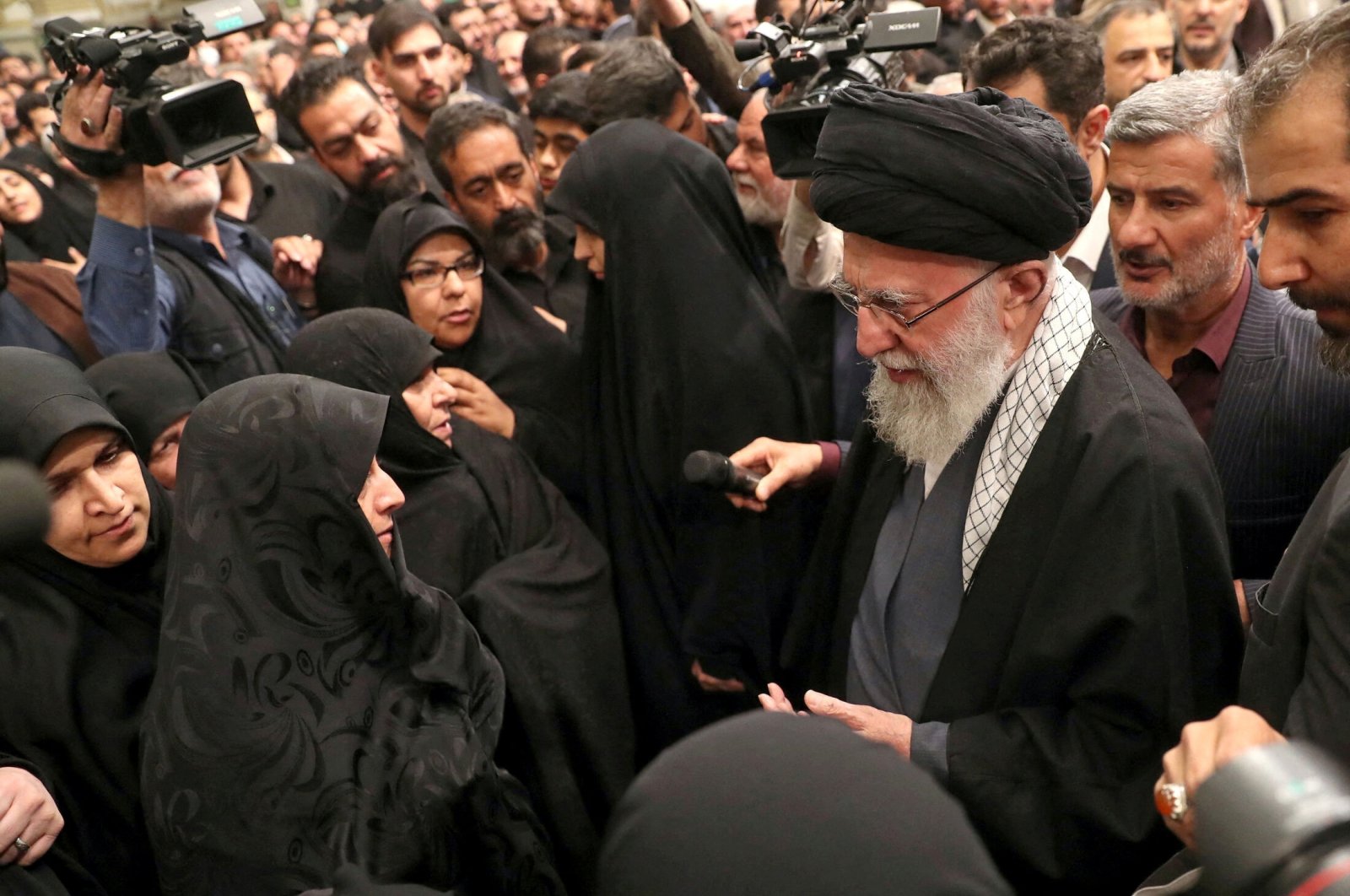 Iranian Supreme Leader Ayatollah Ali Khamenei meets with the family of one of the members of the Islamic Revolutionary Guard Corps who were killed in the Israeli airstrike on the Iranian Embassy complex in the Syrian capital Damascus, during a funeral ceremony, Tehran, Iran, April 4, 2024. (Reuters Photo)