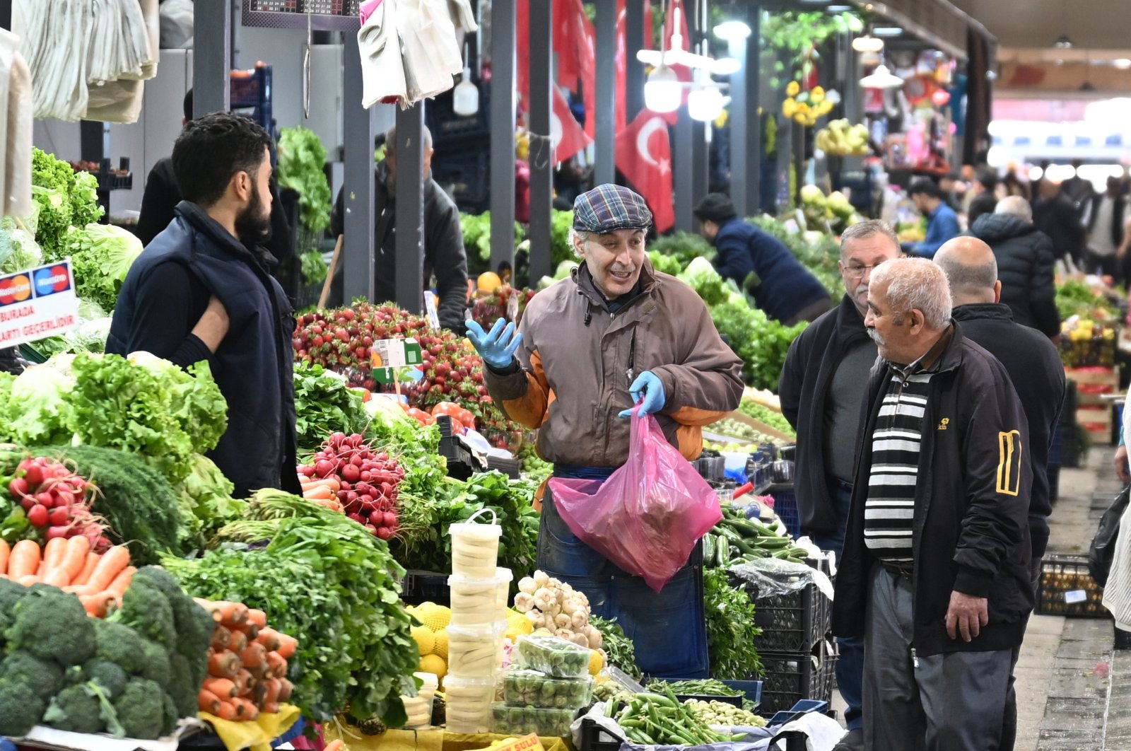 People are seen at a local market in Ankara, Türkiye, April 9, 2024. (AA Photo)