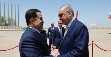 Iraqi Prime Minister Mohammed S. Al Sudani (L) shakes hands with President Recep Tayyip Erdoğan (R) as he welcomes the Turkish leader at Baghdad Airport, Baghdad, Iraq, Aprli 22, 2024. (IHA Photo)
