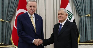 Iraqi President Abdul Latif Rashid (R) welcomes President Recep Tayyip Erdoğan prior to their meeting at the presidential palace, Baghdad, Iraq, April 22, 2024. (AFP Photo)