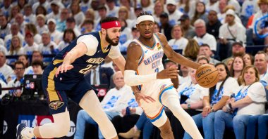 Thunder's Shai Gilgeous-Alexander (R) brings the ball up court against Pelicans in an NBA Playoffs game, in Oklahoma City, U.S., April 21, 2024. (AFP Photo)