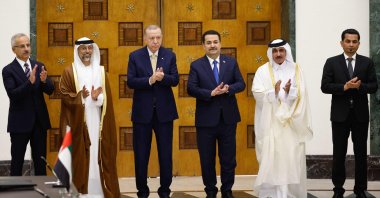 From left, Transport Minister Abdulkadir Uraloğlu, UAE Energy Minister Suhail Mohamed al-Mazrouei, President Recep Tayyip Erdoğan, Iraqi Prime Minister Mohammed S. Al Sudani, Qatari Minister of Transport Jassim bin Saif bin Ahmed al-Sulaiti and Iraq&#039;s Transport Minister Razzaq Muhaibas al-Saadawi applaud during their meeting for the signing of the Development Road framework agreement on security, economy and development, Baghdad, Iraq, April 22, 2024. (AFP Photo)