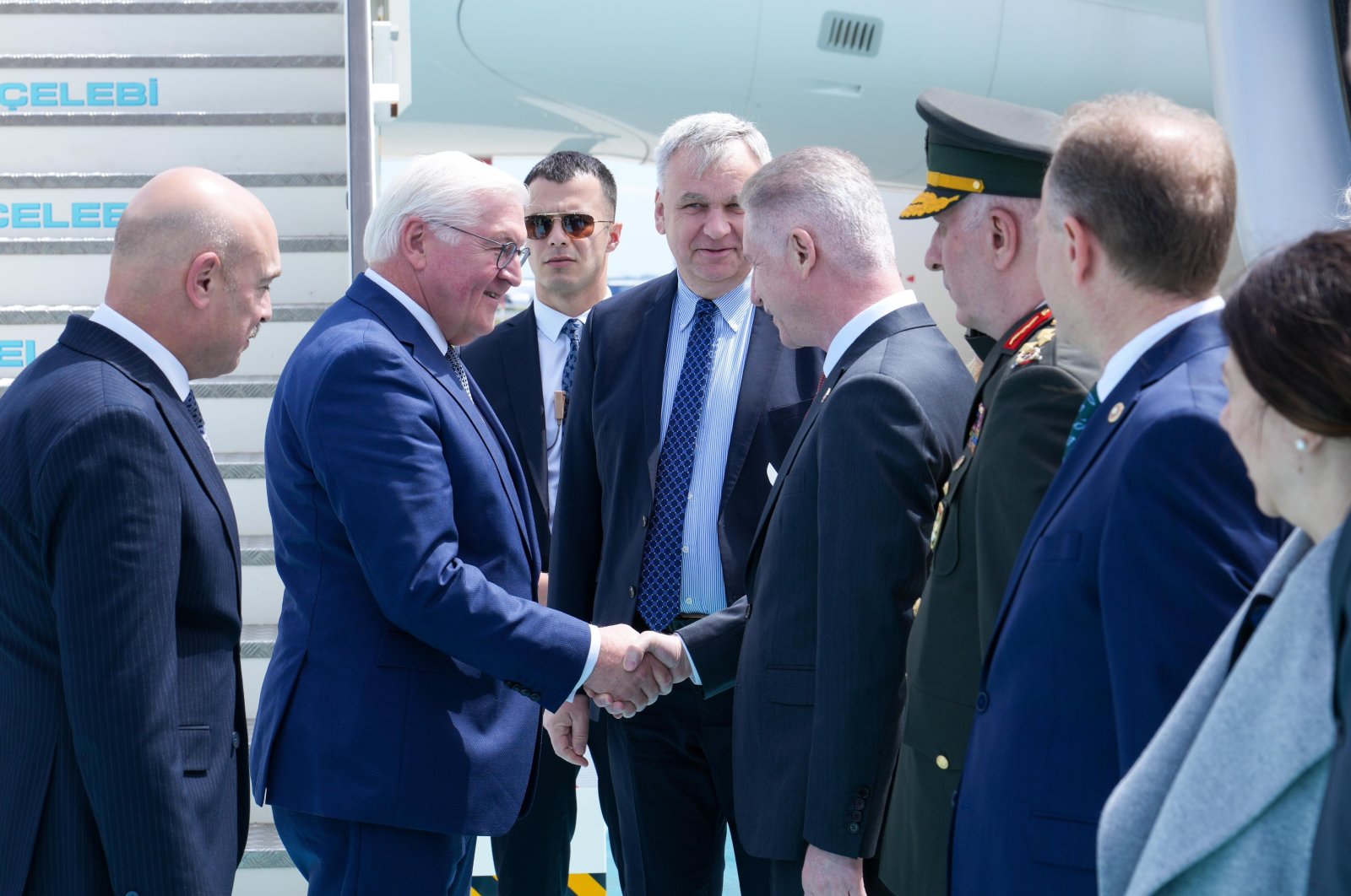 German President Frank-Walter Steinmeier (2nd L) shakes hands with Istanbul Governor Davut Gül at the airport, Istanbul, Türkiye, April 22, 2024. (İHA Photo)