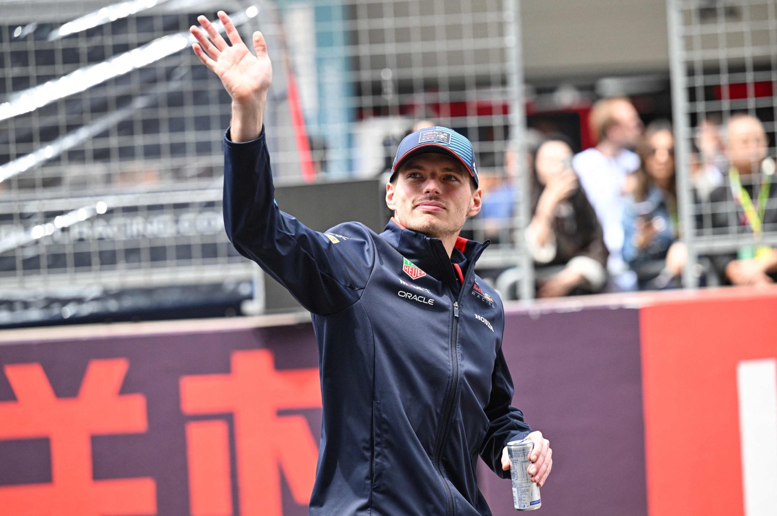 Red Bull Racing&#039;s Dutch driver Max Verstappen waves ahead of the Formula One Chinese Grand Prix, Shanghai, China, April 21, 2024. (AFP Photo)
