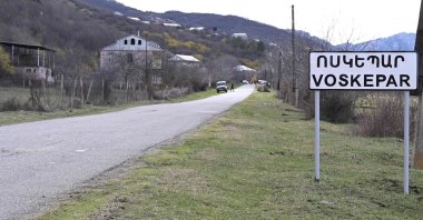 A road sign sits at the entrance to the village of Voskepar, near the delimitation area, northeastern Armenia, March 27, 2024. (AFP Photo)