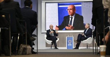 Treasury and Finance Minister Mehmet Şimşek speaks during an event on the sidelines of the International Monetary Fund-World Bank spring meetings, Washington, U.S., April 18, 2024. (AA Photo)