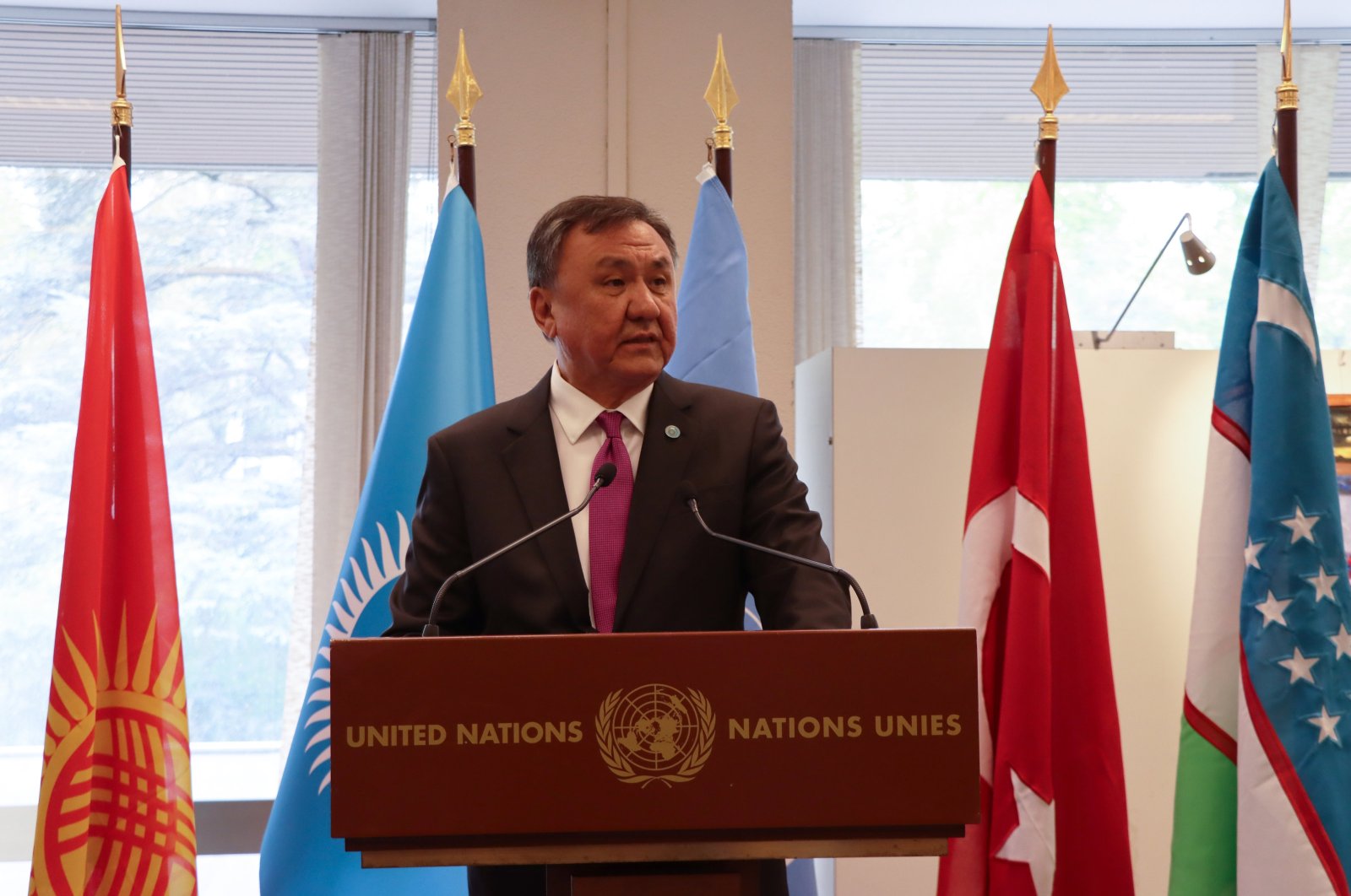 Organization of Turkic States (OTS) Secretary-General Kubanychbek Omuraliev delivers a speech at the U.N. office in Geneva, Switzerland, April 22, 2024. (AA Photo)