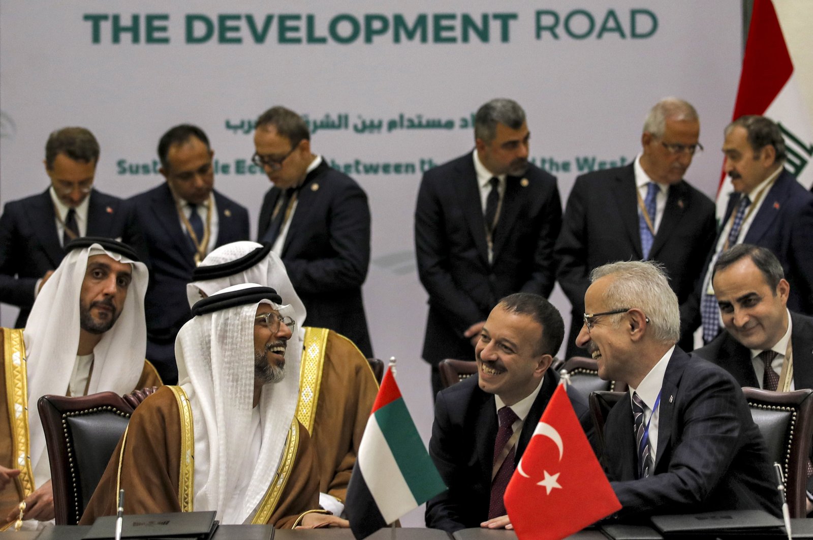 UAE Energy Minister Suhail Mohamed al-Mazrouei (L) and Transport and Infrastructure Minister Abdulkadir Uraloglu (R) speak during the signing of the Development Road framework agreement on security, economy and development, Baghdad, Iraq, April 22, 2024. (EPA Photo)