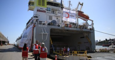 Turkish Red Crescent (Kızılay) staff see off an aid vessel destined for Gaza, Mersin, southern Türkiye, April 16, 2024. (İHA Photo)