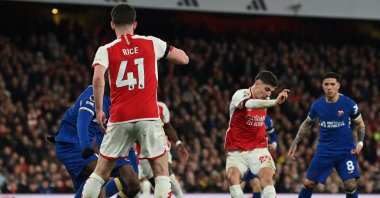 Arsenal&#039;s Kai Havertz (2nd R) shoots to score their fourth goal during the English Premier League football match against Chelsea at the Emirates Stadium, London, U.K., April 23, 2024. (AFP Photo)