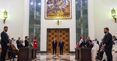 Iraq's Prime Minister Mohammed Shia al-Sudani (R) and President Recep Tayyip Erdoğan attend the signing of the "Development Road" framework agreement on security, economy, and development in Baghdad, Iraq, April 22, 2024. (Reuters Photo)