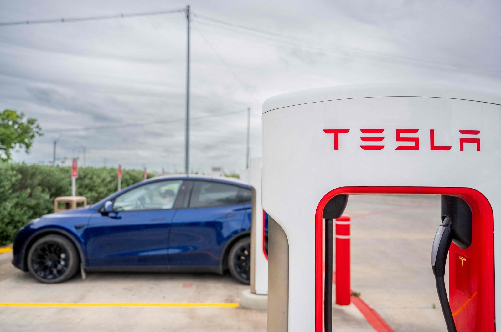 Tesla supercharging stations near a Circle K gas station in Austin, Texas, U.S., April 23, 2024. (AFP Photo)