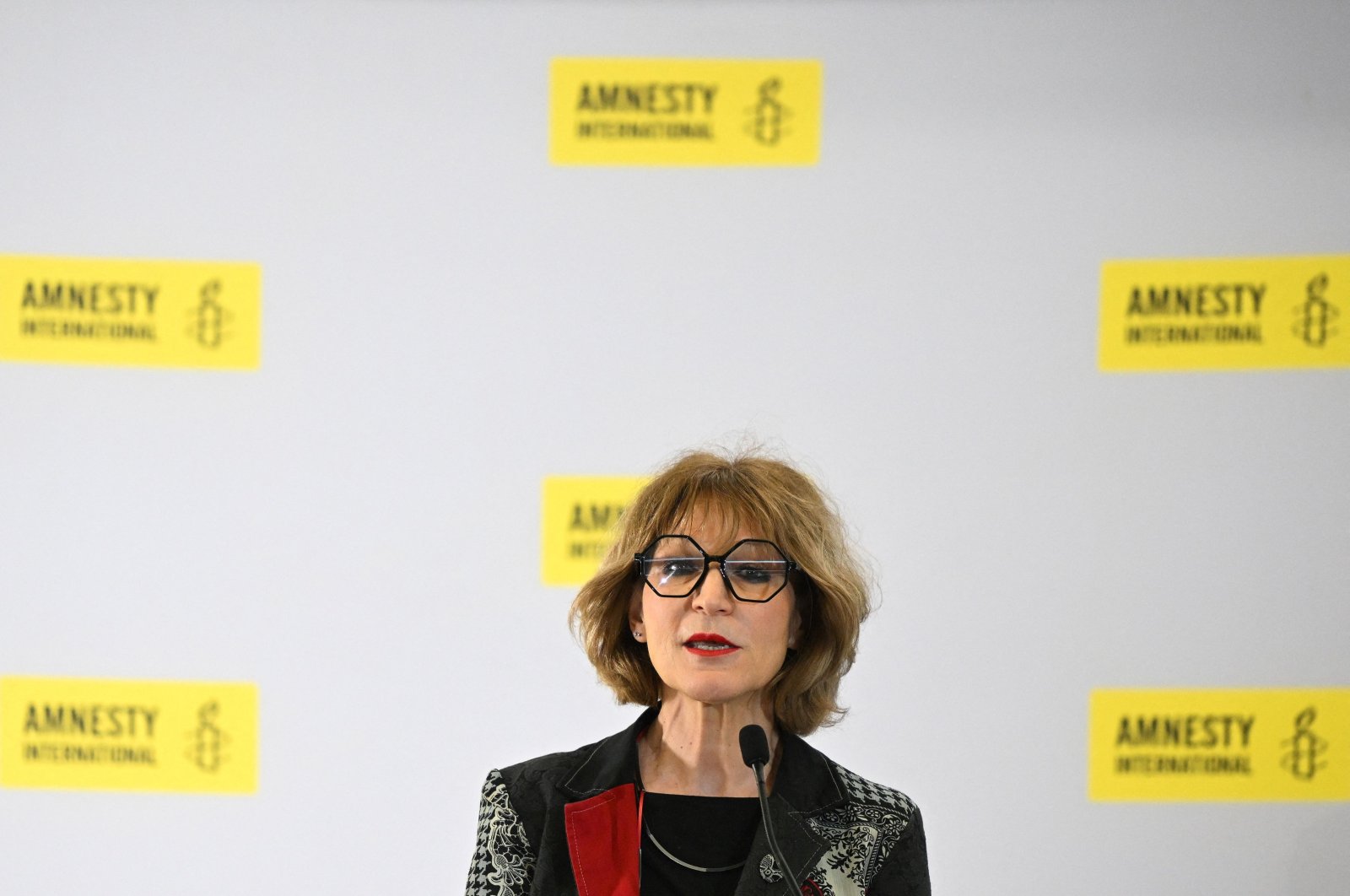 French human rights activist and Secretary-General of Amnesty International Agnes Callamard speaks during a press conference, in London, on April 23, 2024. (AFP Photo)