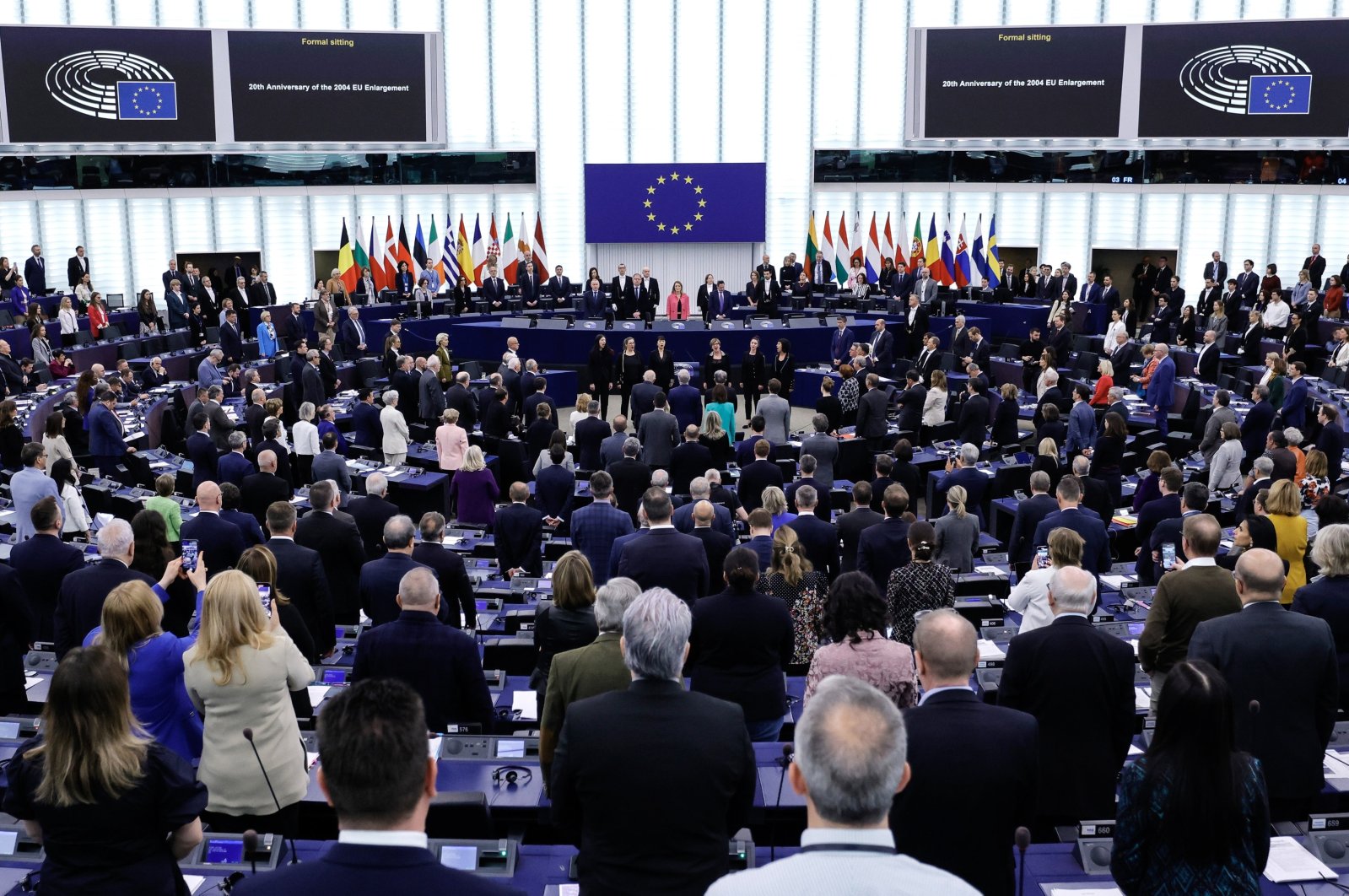 Members of the European Parliament stand as they listen to the European anthem during a formal sitting on the 20th anniversary of the 2004 EU Enlargement at the European Parliament in Strasbourg, France, April 24, 2024. (EPA Photo)