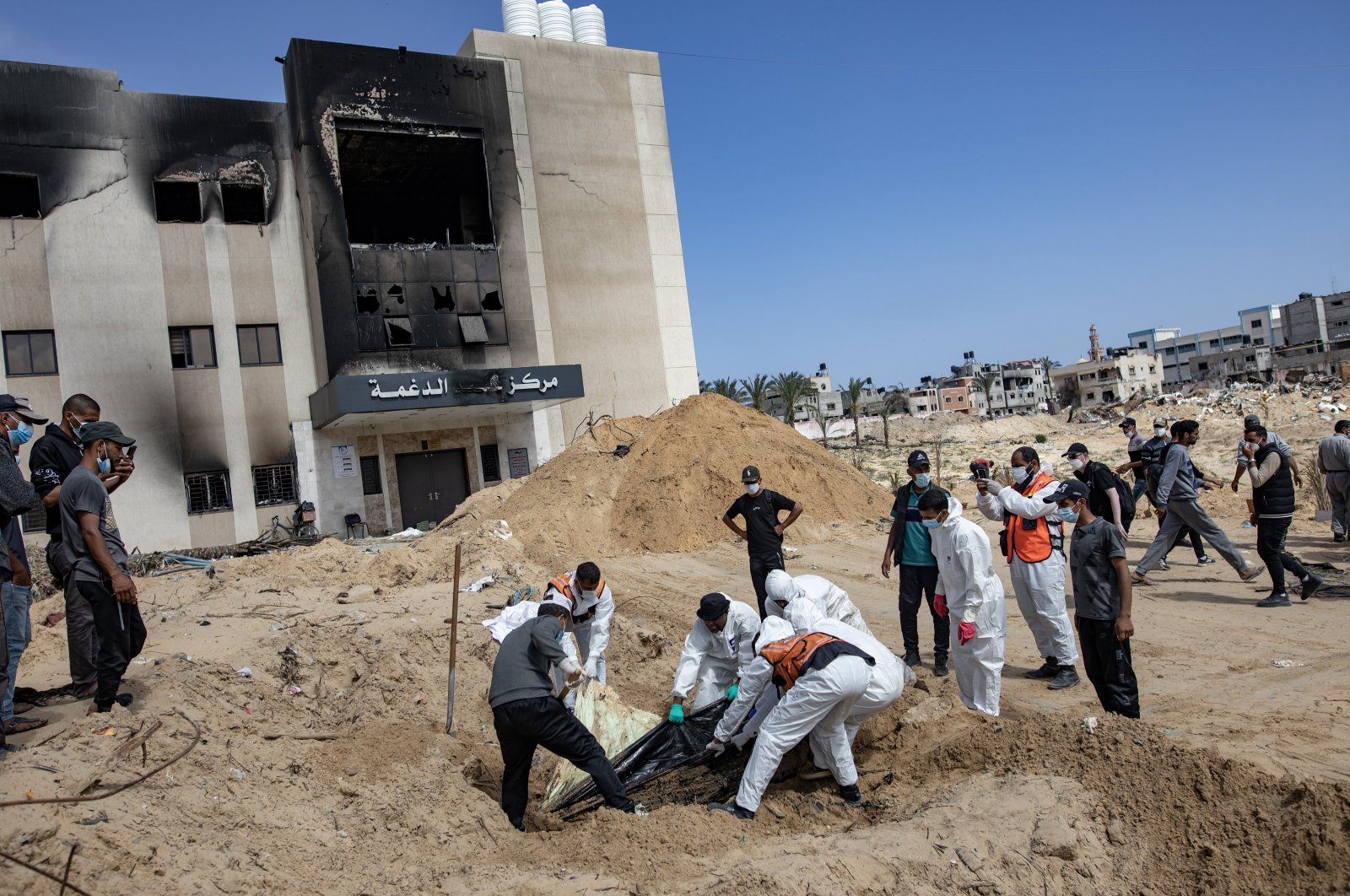 The Palestinian Civil Defense recovers 50 bodies from a mass grave inside Nasser Hospital in Khan Younis, Gaza, Palestine, April 21, 2024. (EPA Photo)