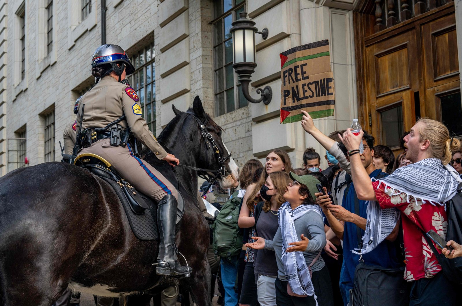 Mounted police face demonstrators protesting Israel&#039;s war on Gaza at the University of Texas at Austin, Austin, Texas, U.S., April 24, 2024. (AFP Photo)